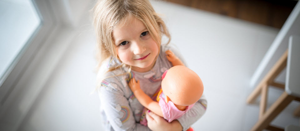 Playing with dolls